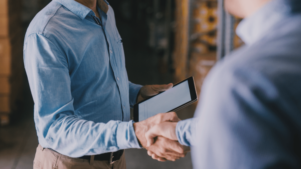Two people shaking hands.