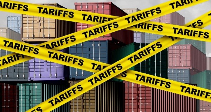 An image showing multiple containers with tariff labels.