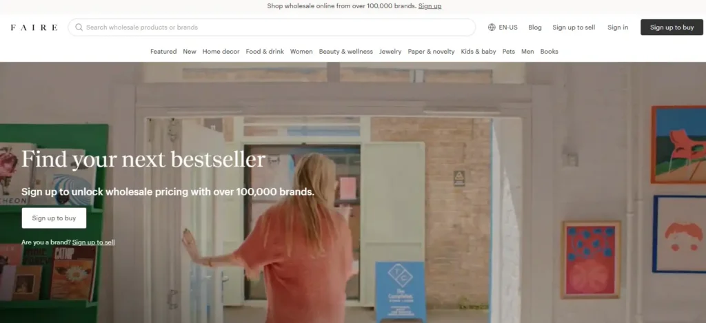 Faire homepage screenshot showing a wholesale marketplace for boutique and artisan product resellers, with product search, category navigation, sign-up options, and “find your next bestseller” hero banner.