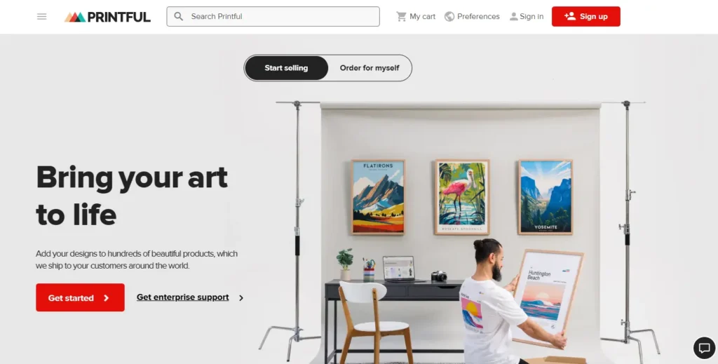 Printful homepage screenshot showing custom branded product selling options, product search, sign-up button, and “bring your art to life” hero banner for Australian resellers.