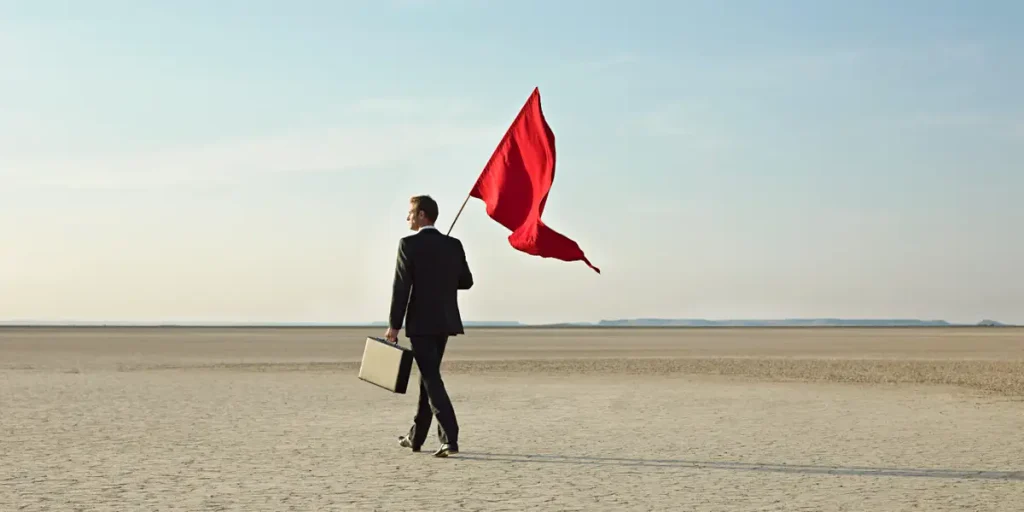 a person holding red flag