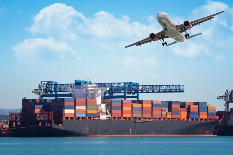 a ship in ocean and airplane is flying on the sky